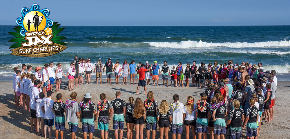 Photo of Childhood Cancer camp group holding hands before the camp begins